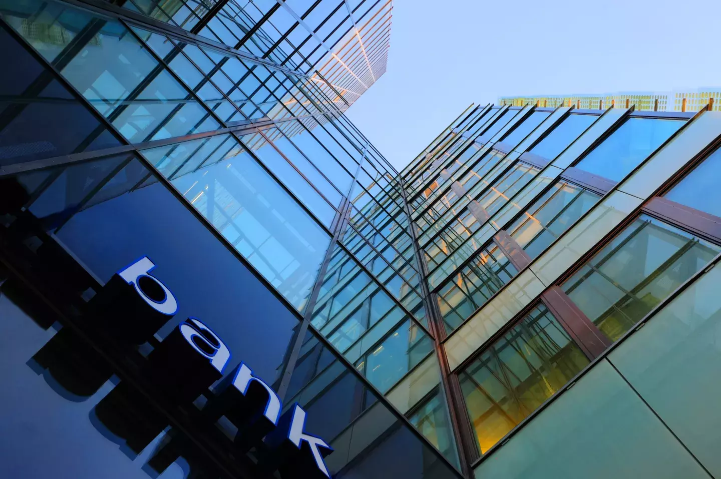 View of bank buildings from the street looking up