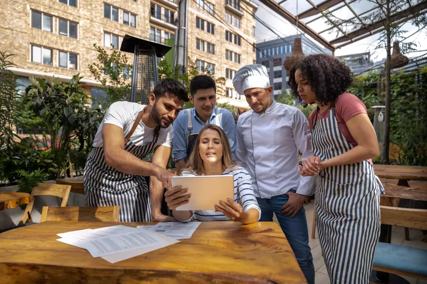 Restaurant staff reviewing their menu