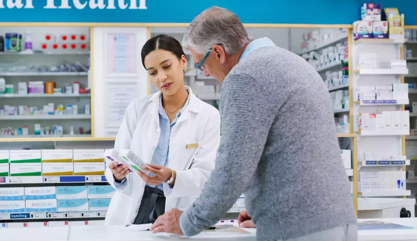 Elder man at the pharmacy counter